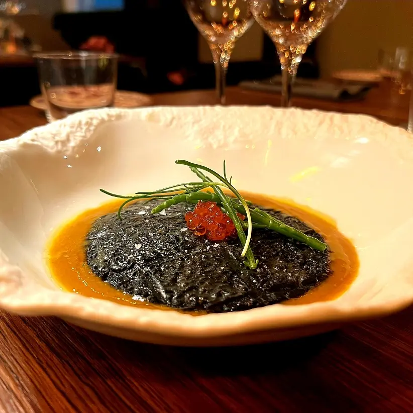 creation thumb for Crabb squidink ravioli, liquorise crabb bisque, lake corall