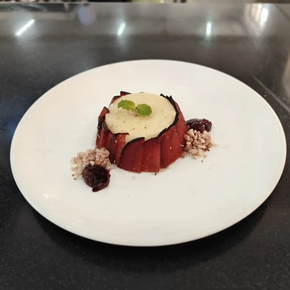 creation thumb for Plum panacotta with blueberry compote.
