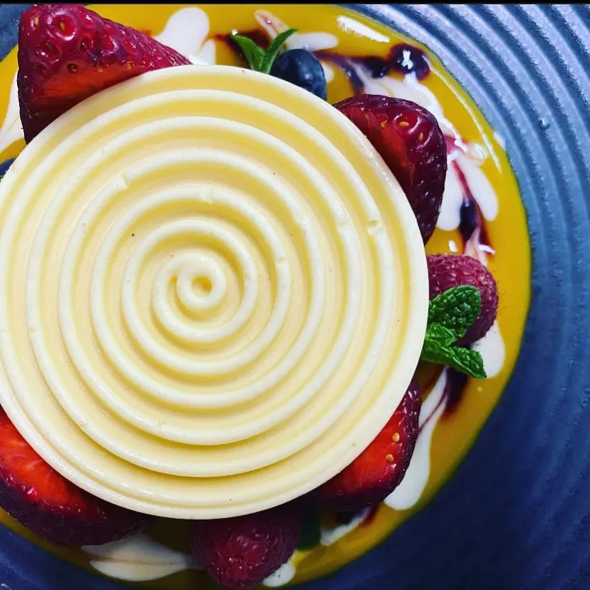 creation thumb for Pannacotta with passion fruit cream and wild berries