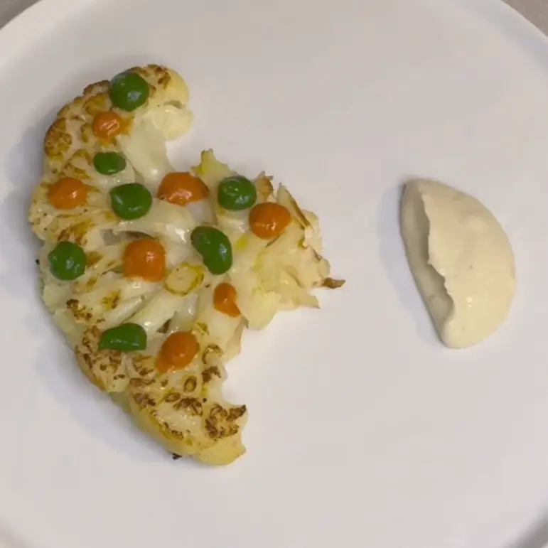creation thumb for Cauliflower Steak, Hazelnut Cream, Tomato & Spinach Sauce
