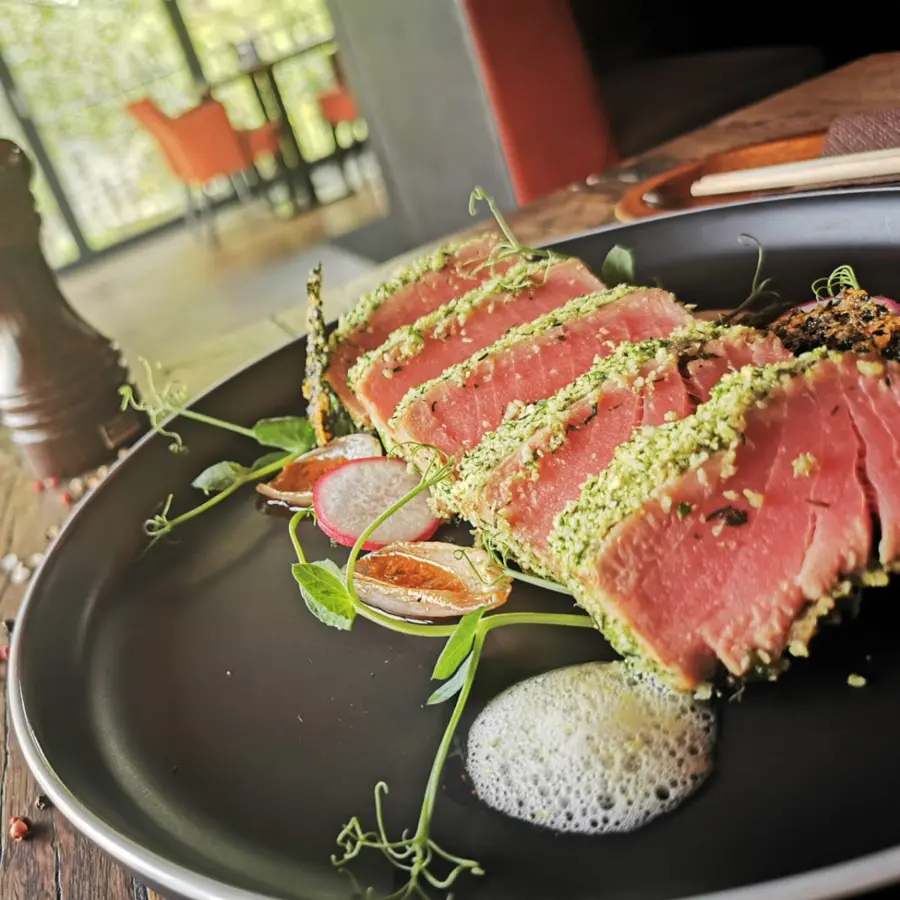 creation thumb for tuna fillet in herb crust (predominantly tarragon), asparagus, shallot with red pesto, lemon mousse and parmesan chips with black sesame and herbs