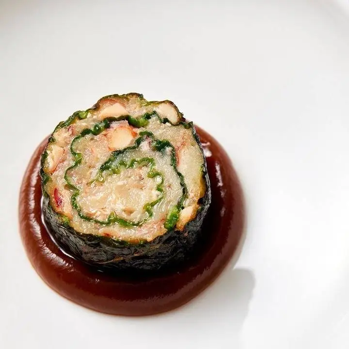 creation thumb for Morsel of lobster claw, wrapped in fried hispi cabbage