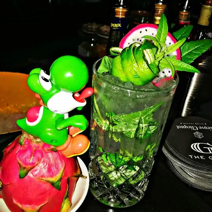 creation thumb for ~ Yoshis`s Dragon Mojito ~ 
Bacardi Dragon Berry // Fresh Lime
Lemon Juice // Soda // Sugar Powder
Mint Springs // Dragon Fruit