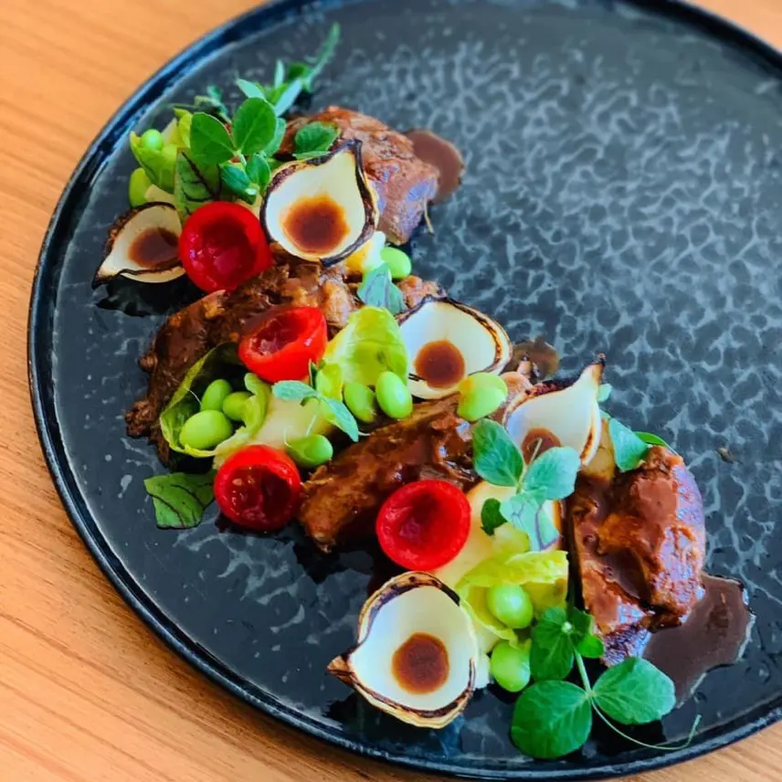 creation thumb for Spiced lamb shank, hunan style potatoes, edamame, onion jus