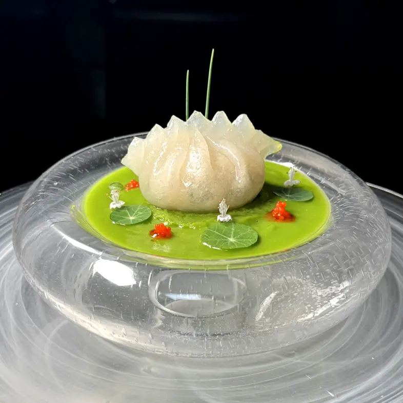creation thumb for Raviolo di Granchio al Fiore di Loto