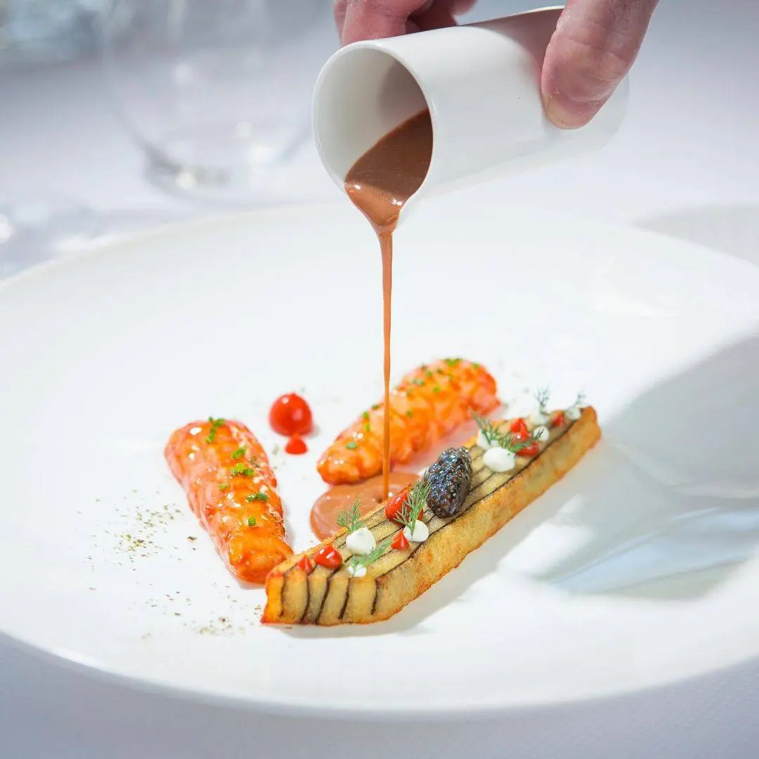 creation thumb for Seared langoustines, flambeed with Cognac, shellfish broth