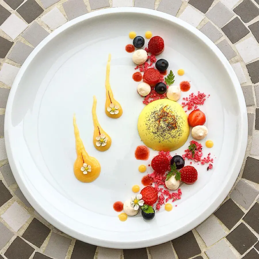 creation thumb for panna cotta with saffron and vanilla, lemon curd, marinated strawberries, meringue, strawberry meringue crumble, strawberry coulis