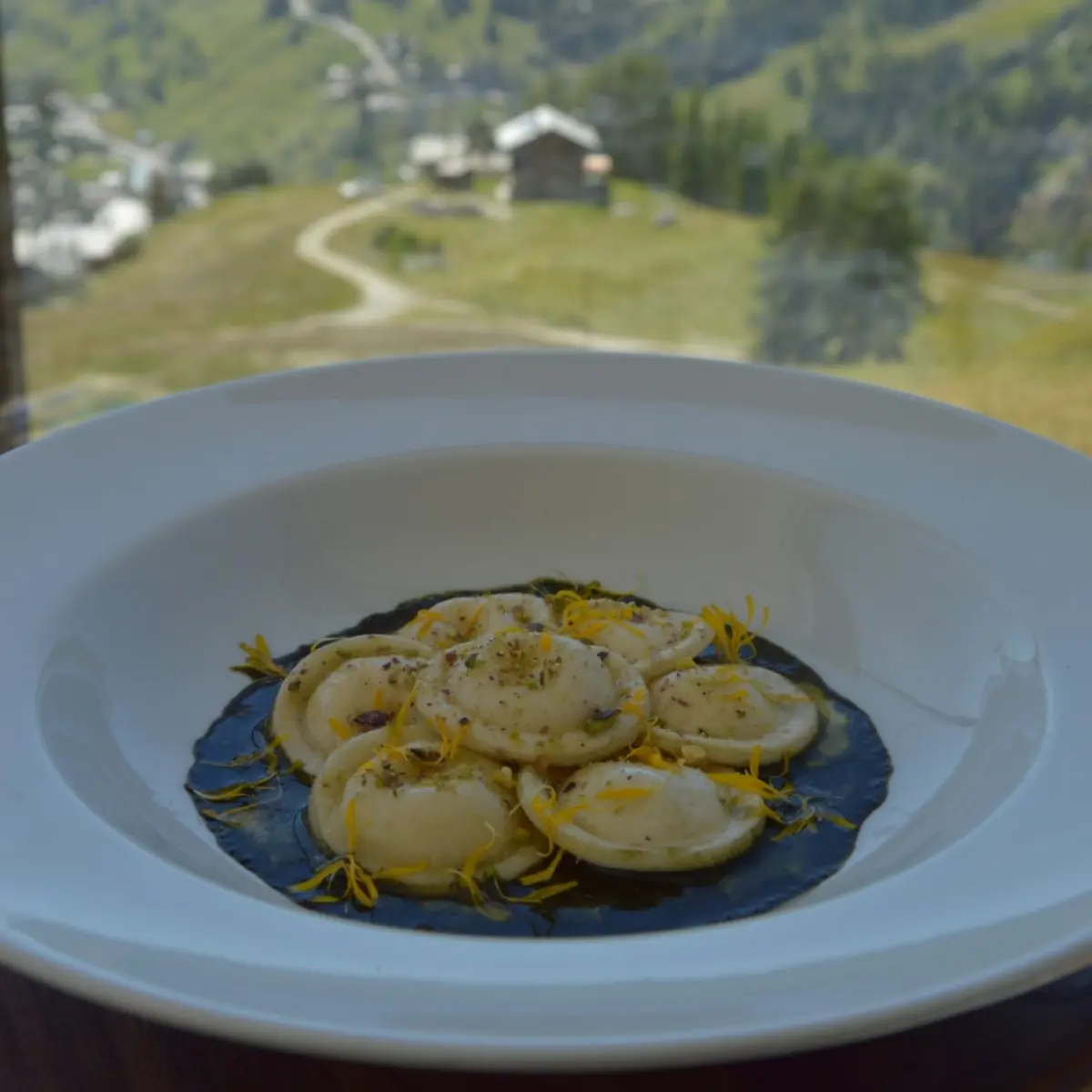 creation thumb for Ravioli with blue d'aoste, pistachios, and alpine flora