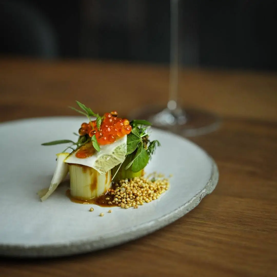 creation thumb for Charred leeks, miso sauce, trout egg, seasonal sprouts