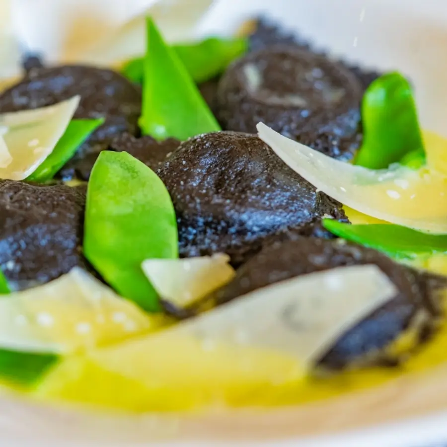 creation thumb for Leek & Ricotta Black Ravioli with Leek Butter, Parmezan & Snow Peas