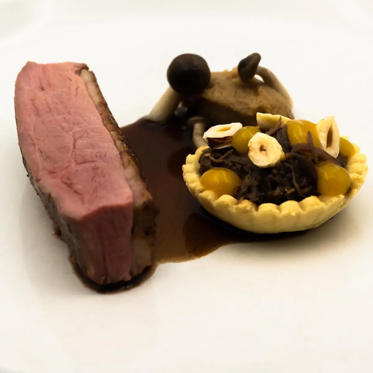 creation thumb for Sous vide duck breast,duck leg ragout tart, Hazlenut purée, Apricot gel,Duck sauce.