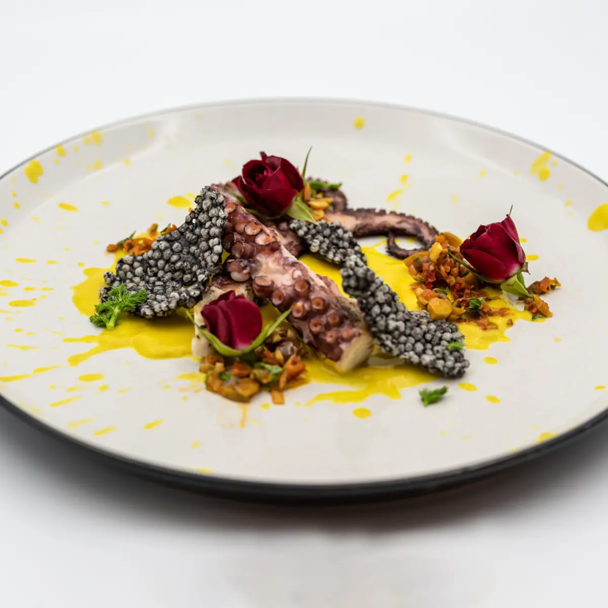 creation thumb for Grilled octopus,saffron and fennel purée,Nduja,olive & tomato salsa,squid ink tapioca.
