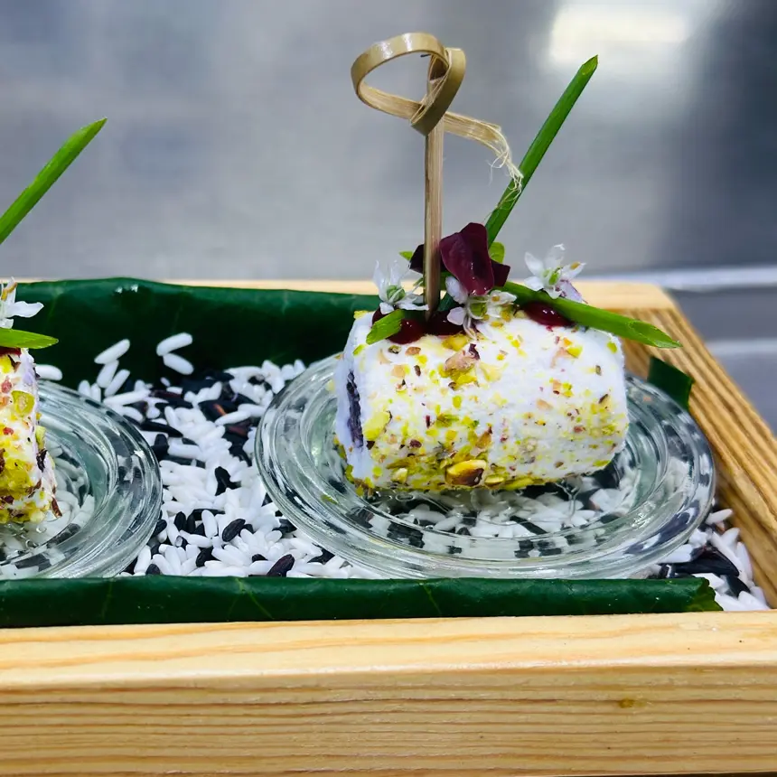 creation thumb for Goatcheese Roulade coated pistachio serve with berry sauce