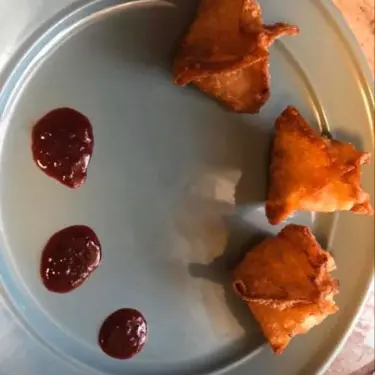 creation thumb for Duck confit Rangoon with port wine dipping sauce.