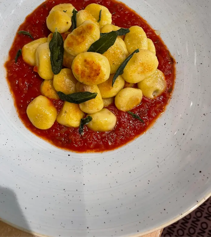 creation thumb for Stuffed gnocchi in tomato sauce with fried sage