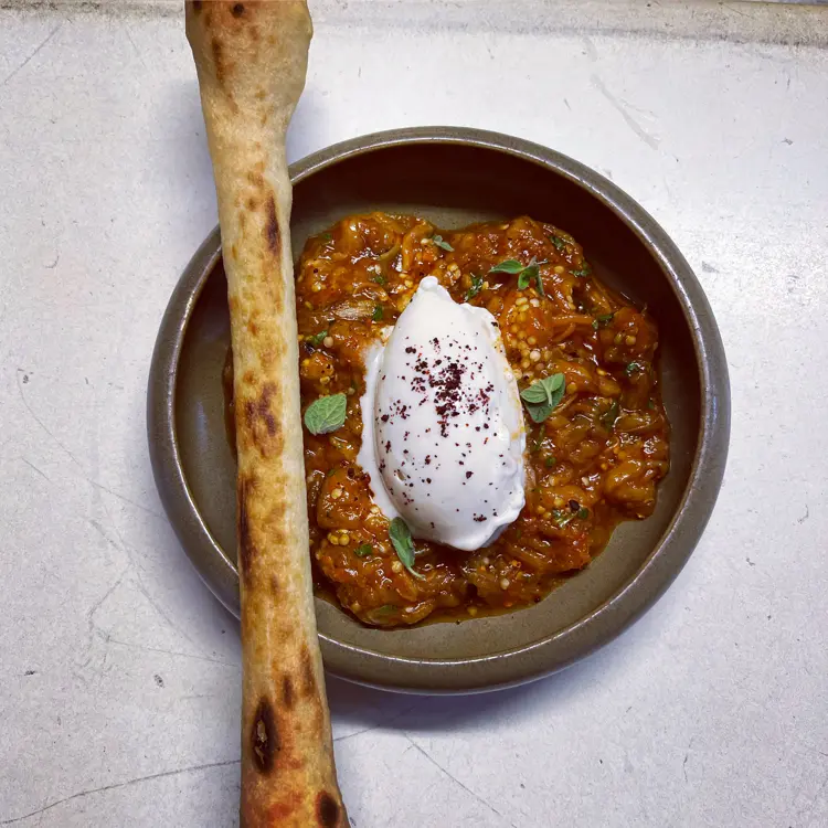 creation thumb for Eggplant miso with Arabic spices and sour almond ice cream.