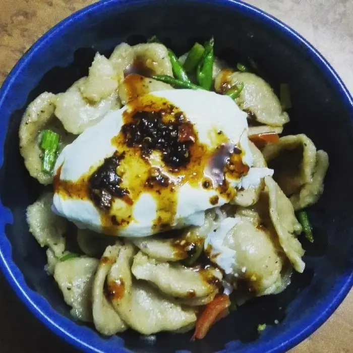 creation thumb for Handmade/homemade durum flour orecchiette with homemade chili oil topped with soft poached egg