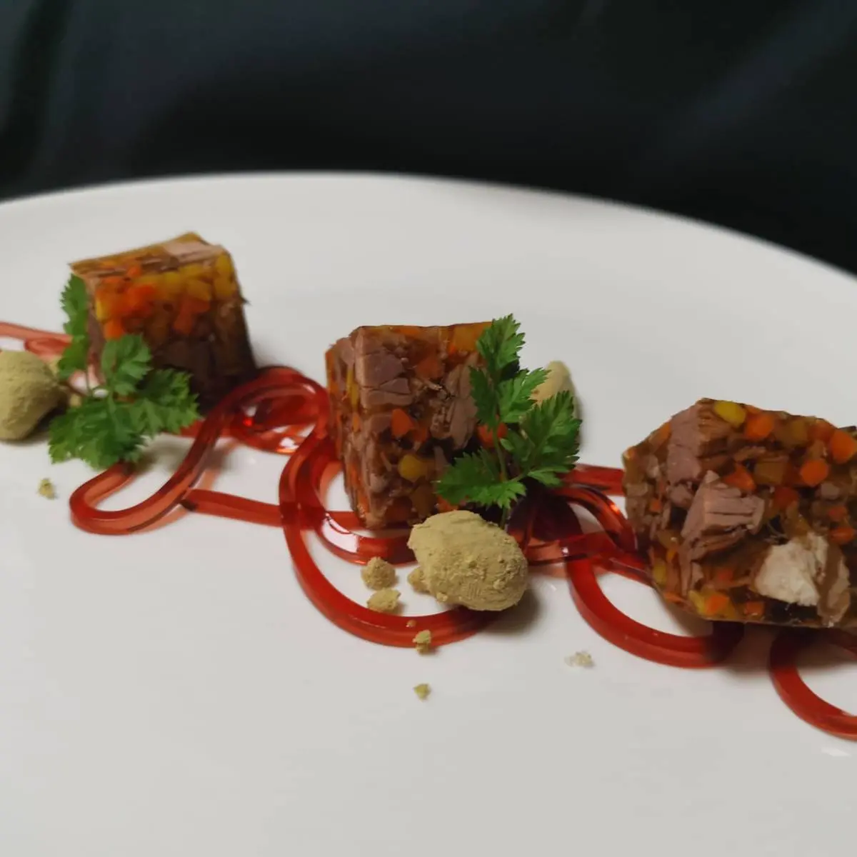 creation thumb for Boiled beef jelly with pumpkin seed oil and spiced wine