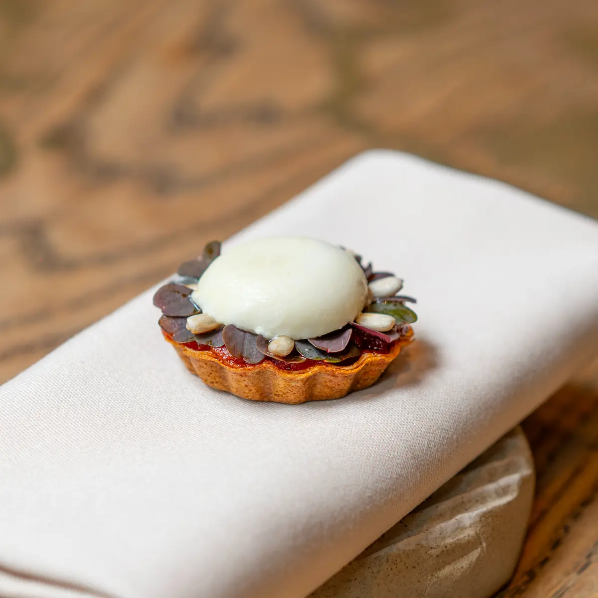 creation thumb for Tartelette with Egusi Melon Seeds and Squid