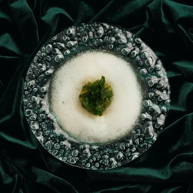 creation thumb for Prawn dolma, fish bone sauce and seaweed foam