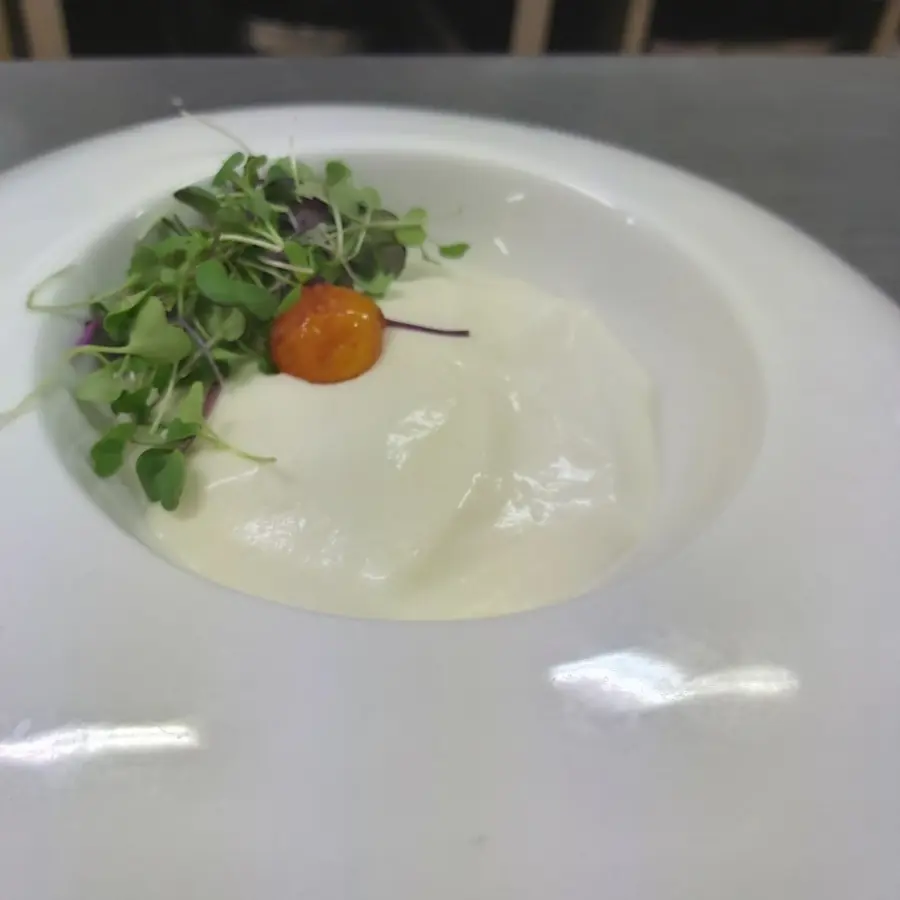 creation thumb for Espuma de alligot con gel de hierbas y yema curada