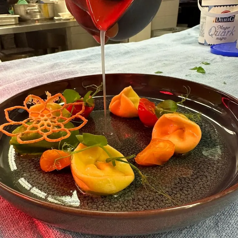 creation thumb for Ricotta ravioli with basil ice cream and tomato consommé