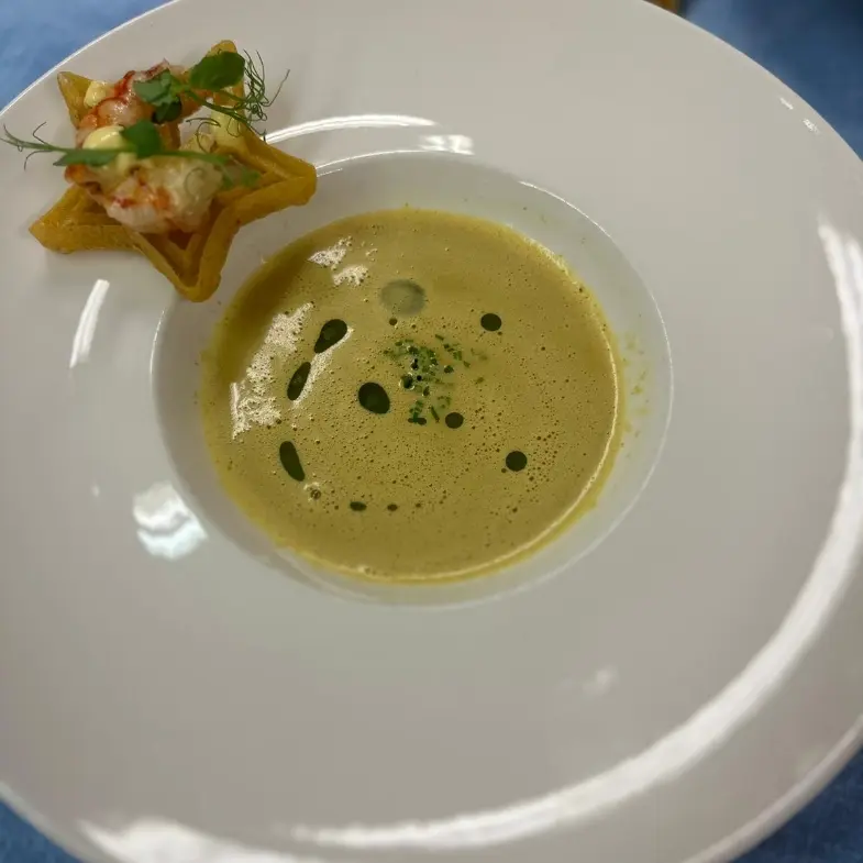 creation thumb for Langostino and curry soup with waffles and prawns