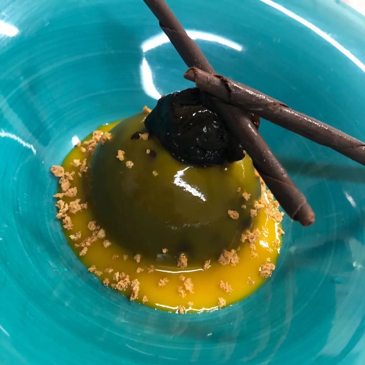 creation thumb for Cupola di cioccolato con gelato al maracuja e salsa al mango con granelle e fico caramellato