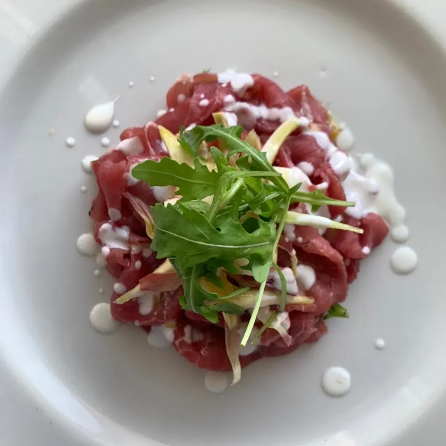 creation thumb for Carpaccio di fassona carciofi pere salsa yogurt