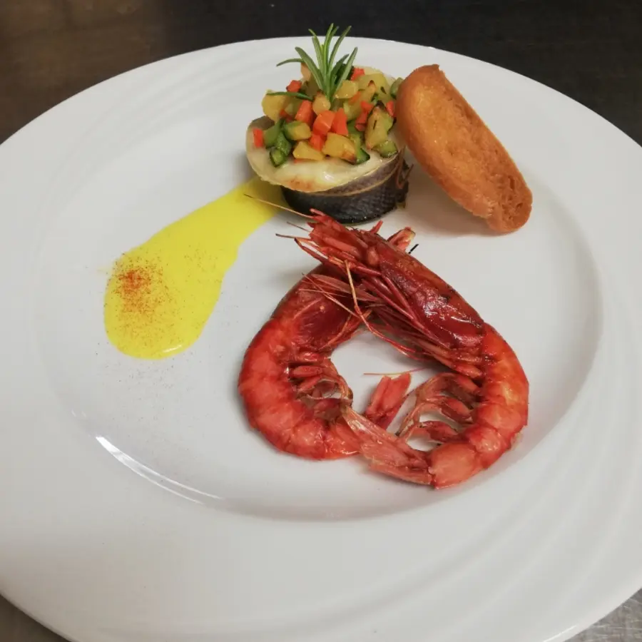 creation thumb for Turbante di branzino CBT con dadolata di verdure croccanti al rosmarino su vellutata allo zafferano accompagnati da gamberoni di mazara alla brace e crostino di pane