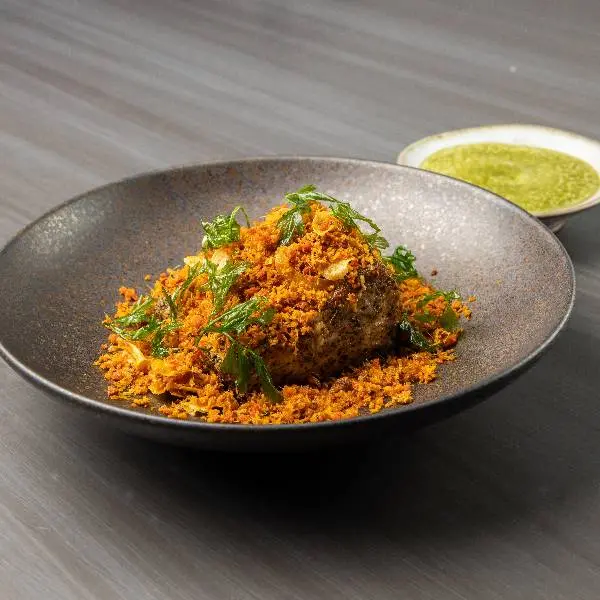creation thumb for Southern Pla Tod Kamin. Coral trout with tumeric, garlic, lemongrass and water celery
