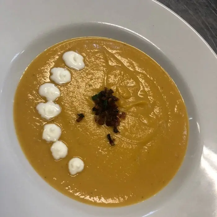 creation thumb for Butternut Squash Soup. Topped with creme fresh bacon and parsley