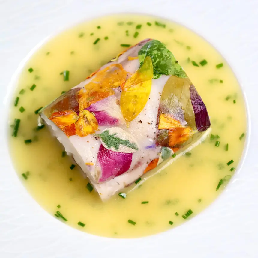 creation thumb for Sea croaker fillet in edible flowers with chive beurre blanc