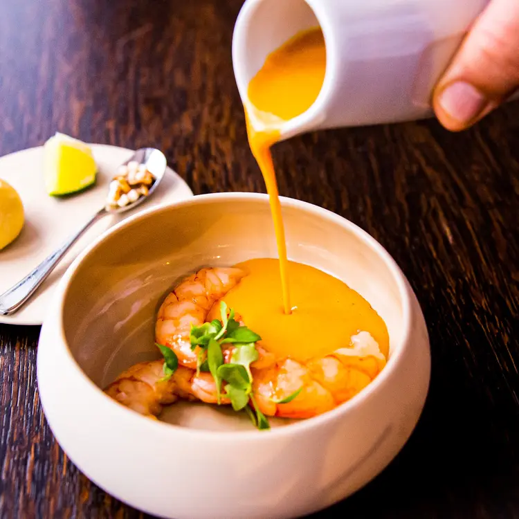 creation thumb for Red curry pilpil sauce with marinated prawns and evoo bread