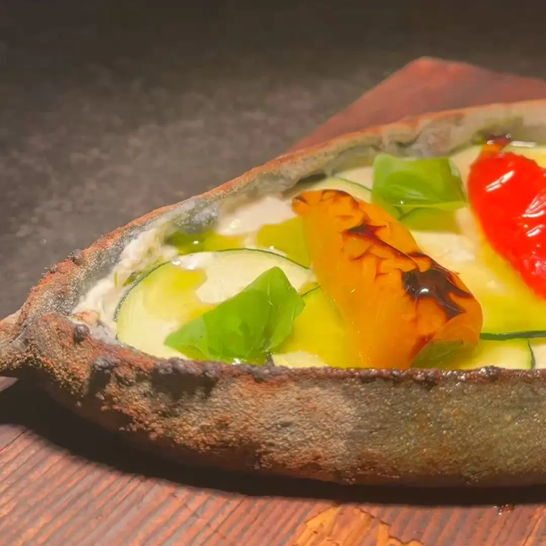 creation thumb for Activated Charcoal Pide with Goat Cheese & Zucchini