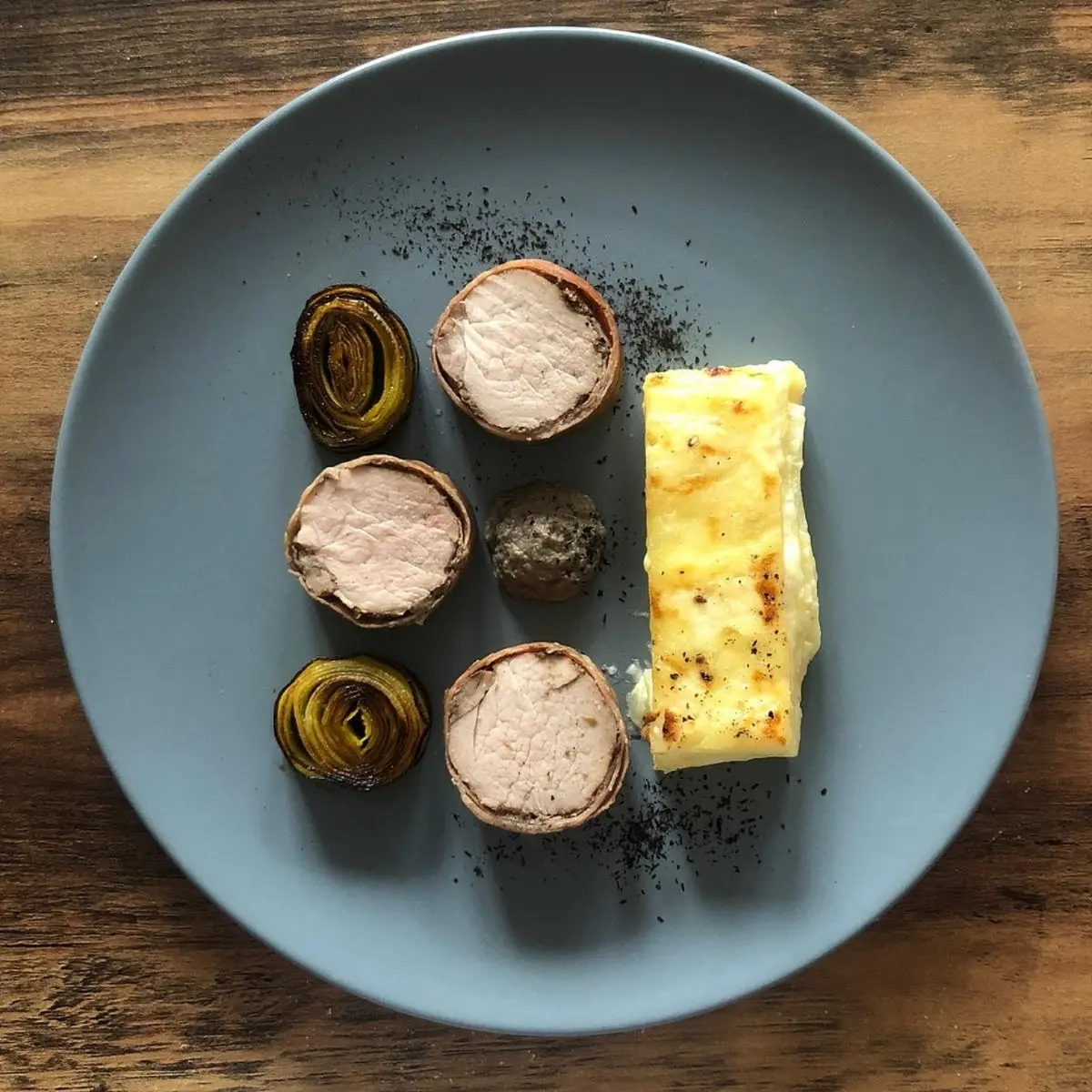 creation thumb for Prosciutto wrapped pork tenderloin, leek ash and potato dauphinoise.
