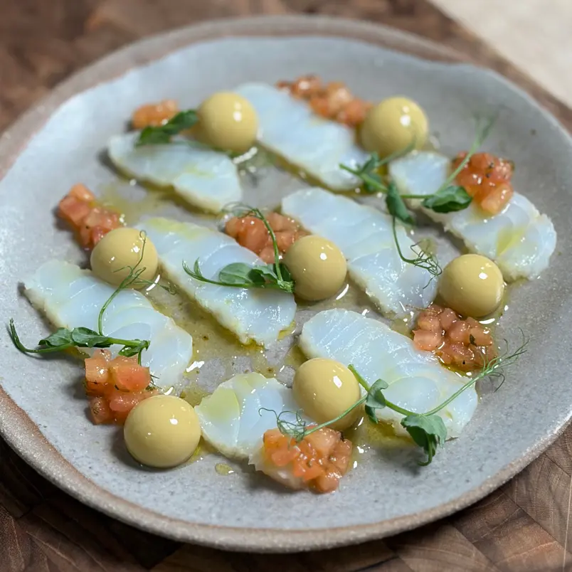creation thumb for Smoked cod carpaccio, concassé of seasoned tomatoes and cavi