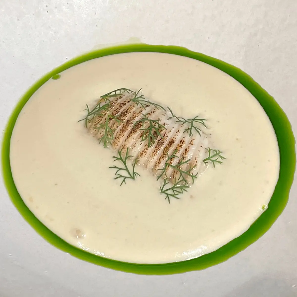 creation thumb for Ali di razza, schiuma di patate al carbone, olio di aneto e germogli di achillea
