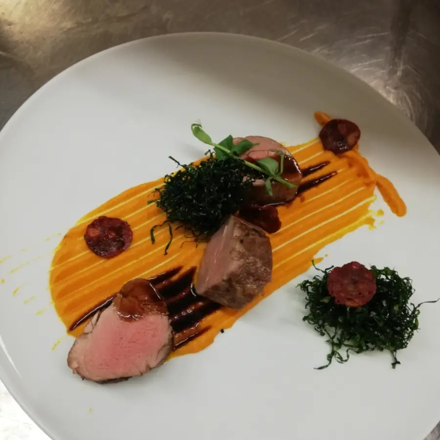 creation thumb for Sous vide pork fillet, carrot and Orange purée, chorizo and crispy cabbage and port jus