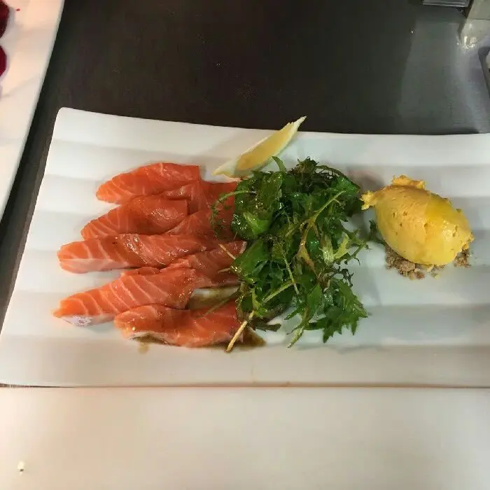 creation thumb for Lachs Sashimi an Wildkräutersalat und pikantem Mango Sorbet.
