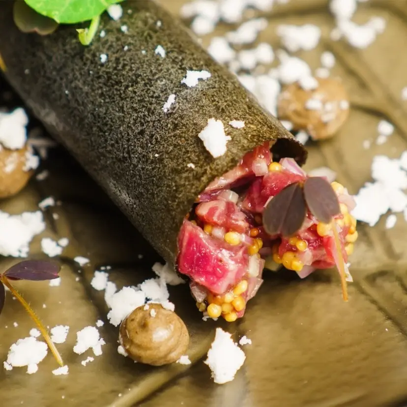 creation thumb for Beef tartar with black garlic cream and celery root chips