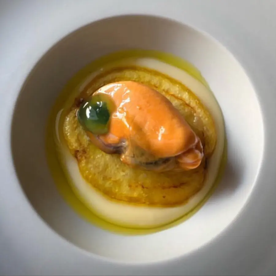 creation thumb for cauliflower sauce, fried potato, smoked oil and mussel in citrus fruit