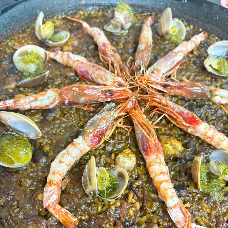 creation thumb for Paella mit Tintenfischen 🐙🦐