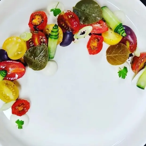 creation thumb for My Greek salad , baby tomatoes red , black ,yellow, baby confit tomatoes, spring onions,cucumber,mousse feta & capers leaves