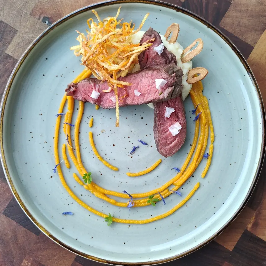 creation thumb for Dry-aged rump steak on celery puree with potato nest