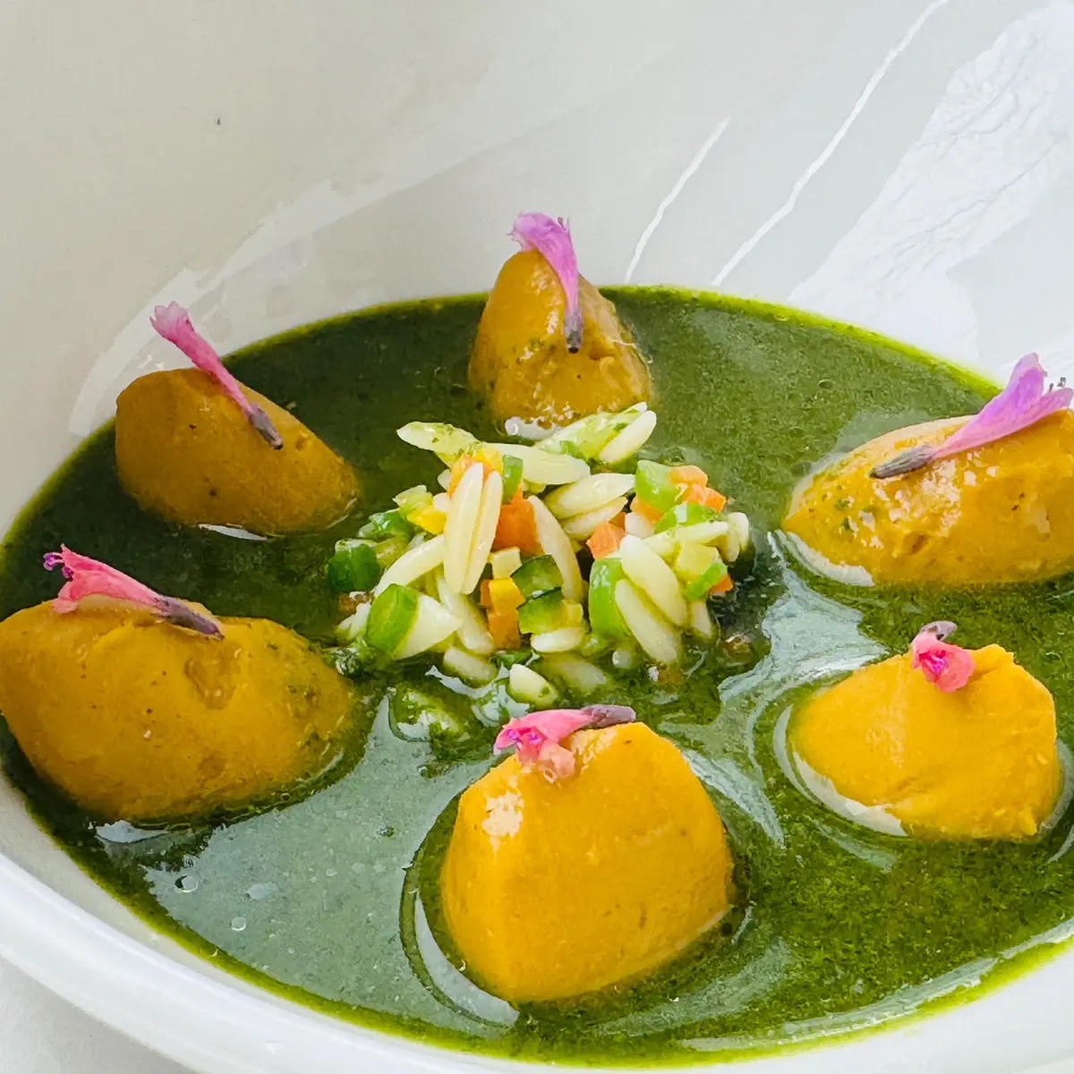 creation thumb for Vegetarian Dumplings with Minestrone Consommé & Basil Pesto