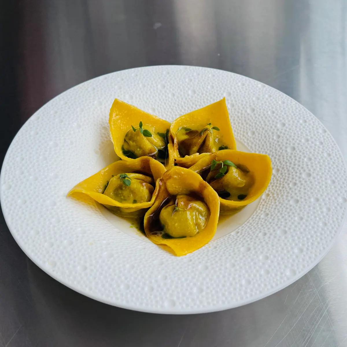 creation thumb for Cappelletti di Guancia di Manzo con Consommé di Midollo