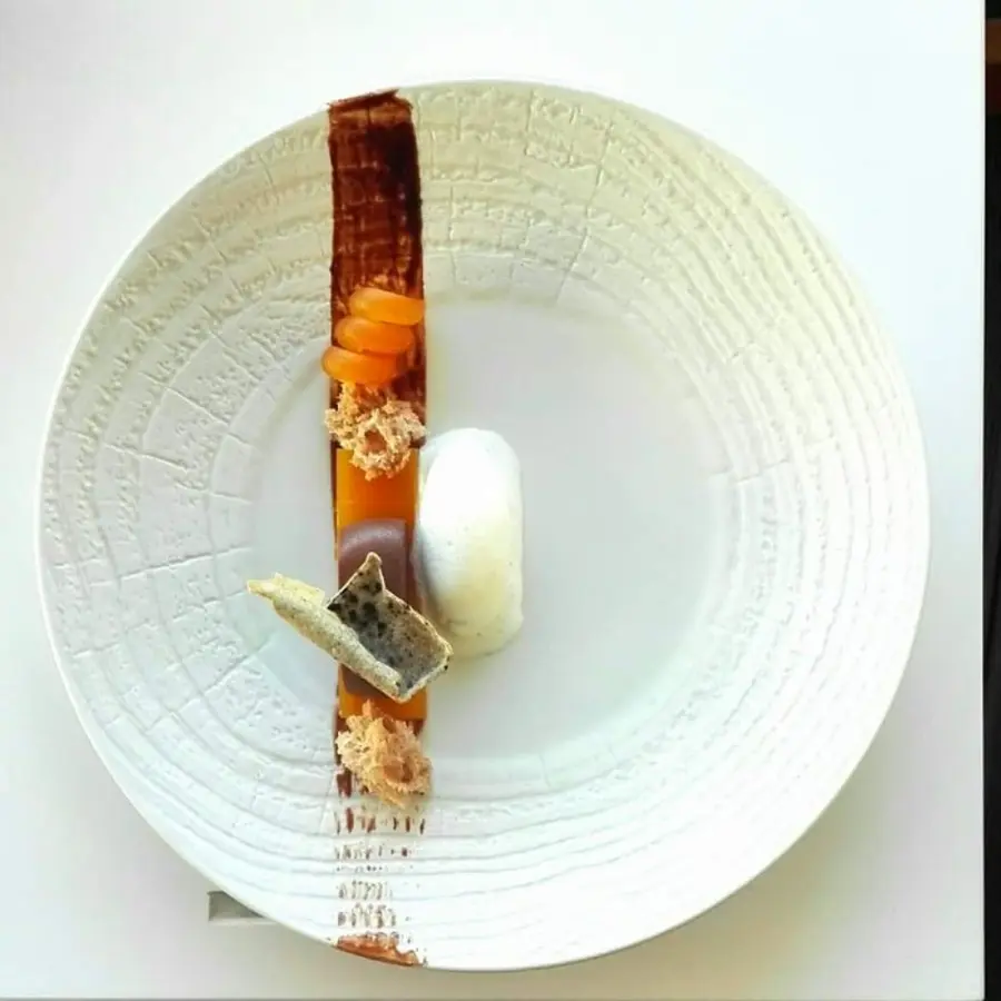creation thumb for Orange-Chocolate mousse, almond sponge, hazelnut flake with burn sweet pumpernickel powder, bay leaf ice cream and apricot spiral.