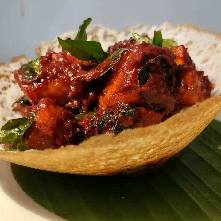 creation thumb for Indian delicacy, appam bowl shaped with chicken ghee roast