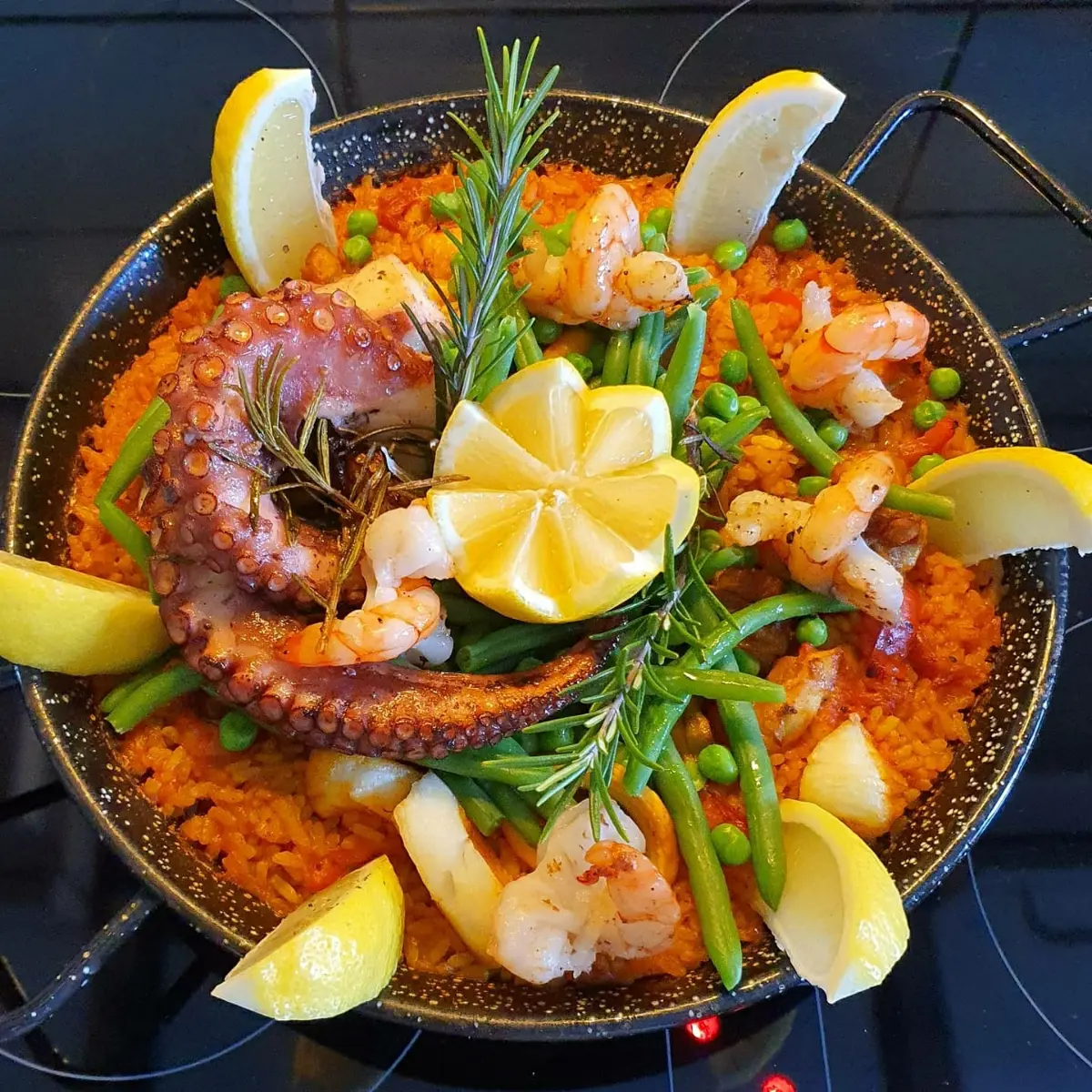 creation thumb for Paella con Pulpo